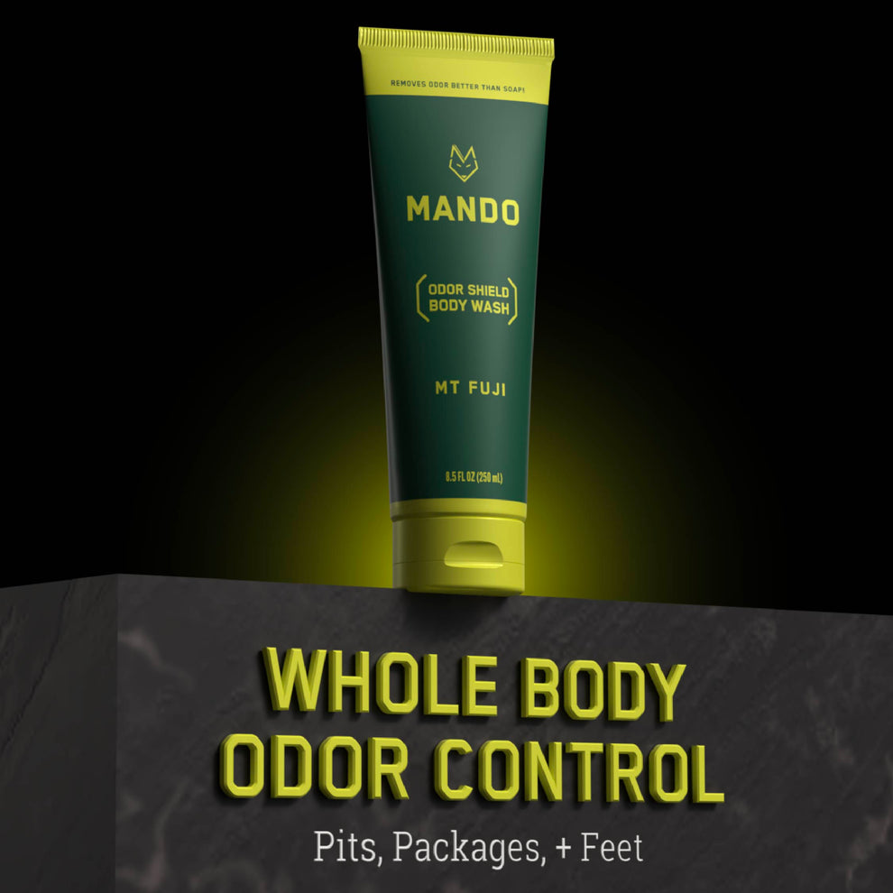 yellow green tube of Mando body wash in Mt Fuji scent with text: whole body odor control, pits, packages + feet 