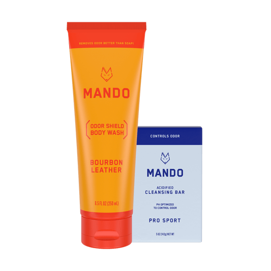 set of yellow orange tube of Mando bourbon leather body wash and blue bar of Mando Pro sport cleansing bar 