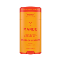yellow orange stick of Mando smooth solid deodorant in bourbon leather scent on white background 