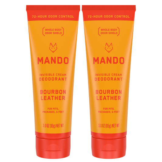 Two orange tubes of Mando invisible cream deodorant in the scent Bourbon Leather